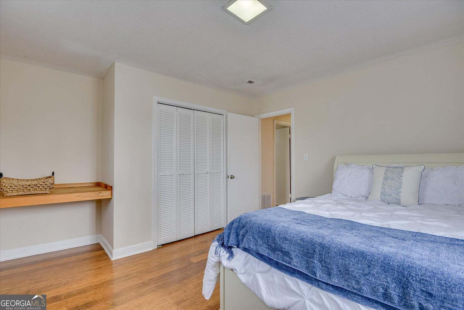 306 Pleasant Home Road Augusta, GA 30907 - Photo 48 of 57 a bedroom with a bed and a chandelier