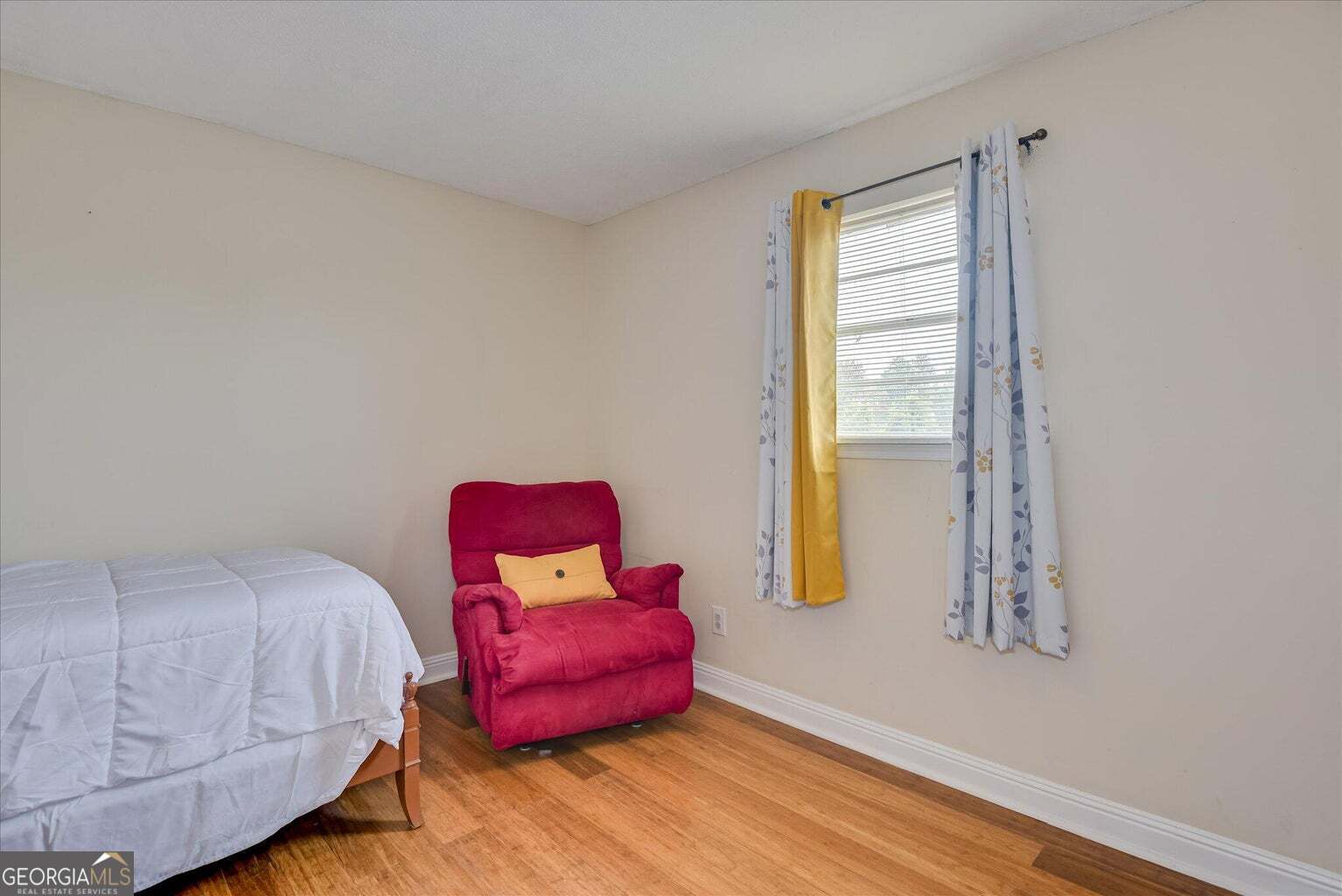 306 Pleasant Home Road Augusta, GA 30907 - Photo 49 of 57 a bedroom with a bed and wooden floor