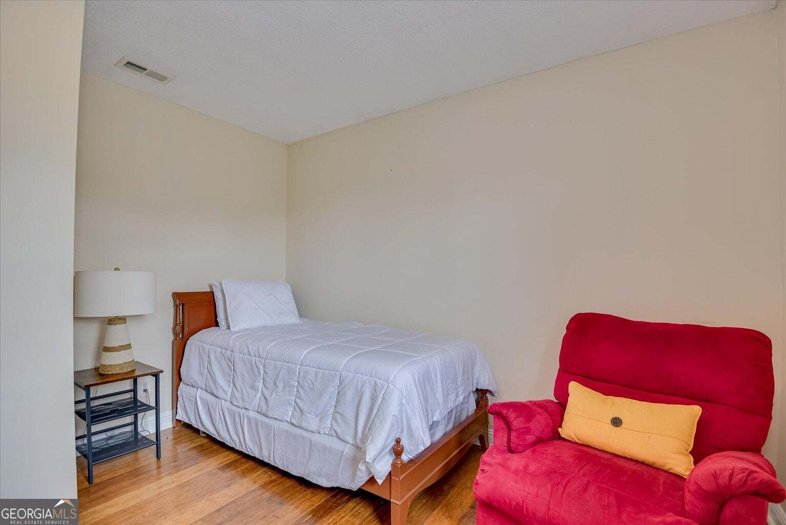 306 Pleasant Home Road Augusta, GA 30907 - Photo 50 of 57 a bedroom with a bed and a couch
