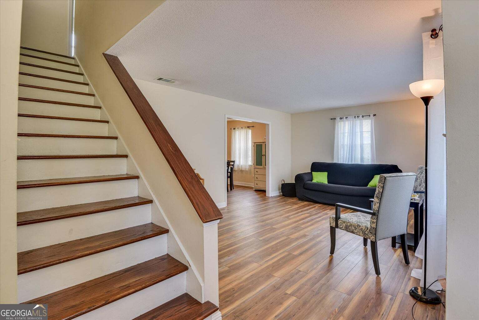 306 Pleasant Home Road Augusta, GA 30907 - Photo 5 of 57 a living room with furniture and a wooden floor