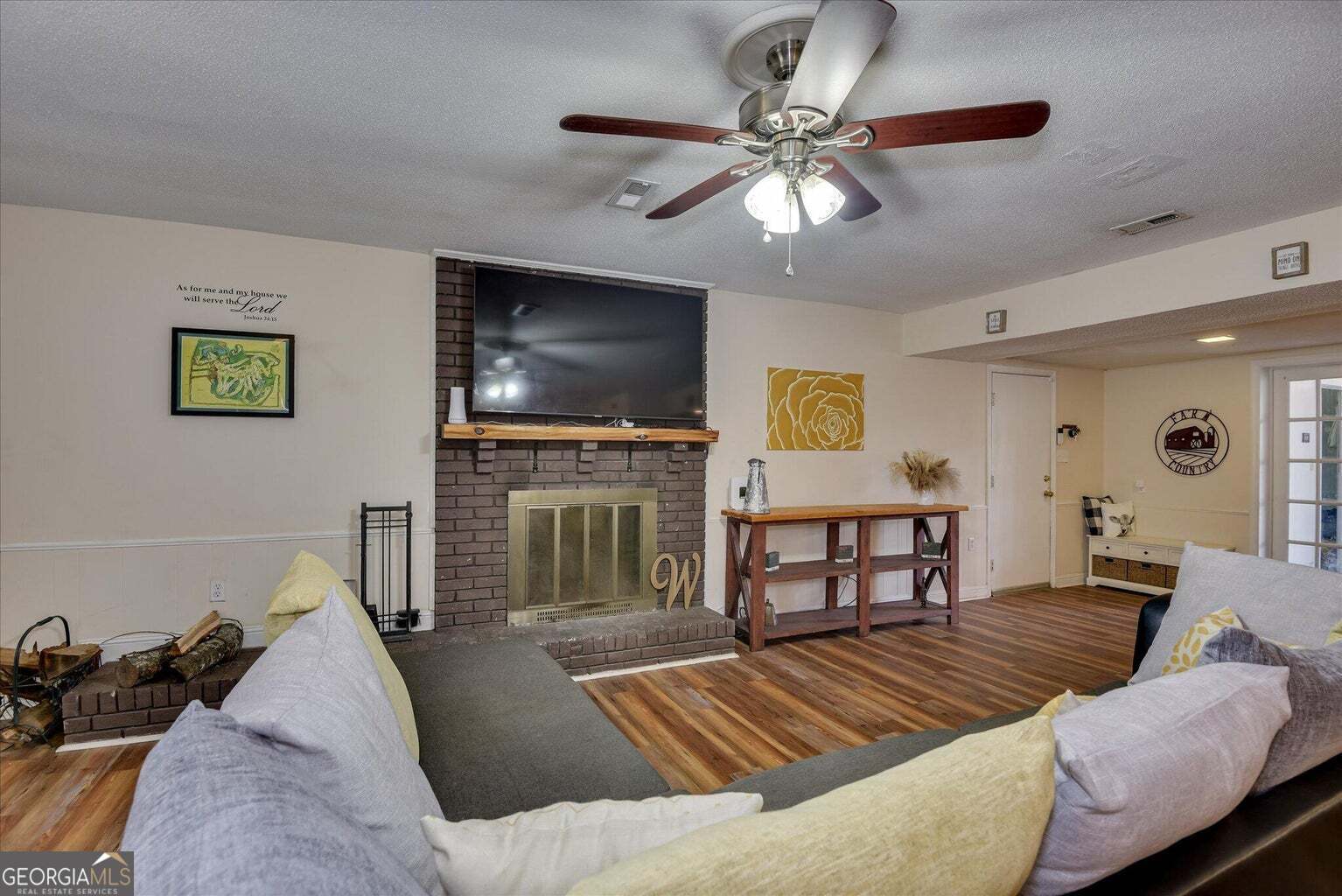 306 Pleasant Home Road Augusta, GA 30907 - Photo 8 of 57 a living room with furniture and a flat screen tv