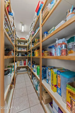 a bedroom with bed and window