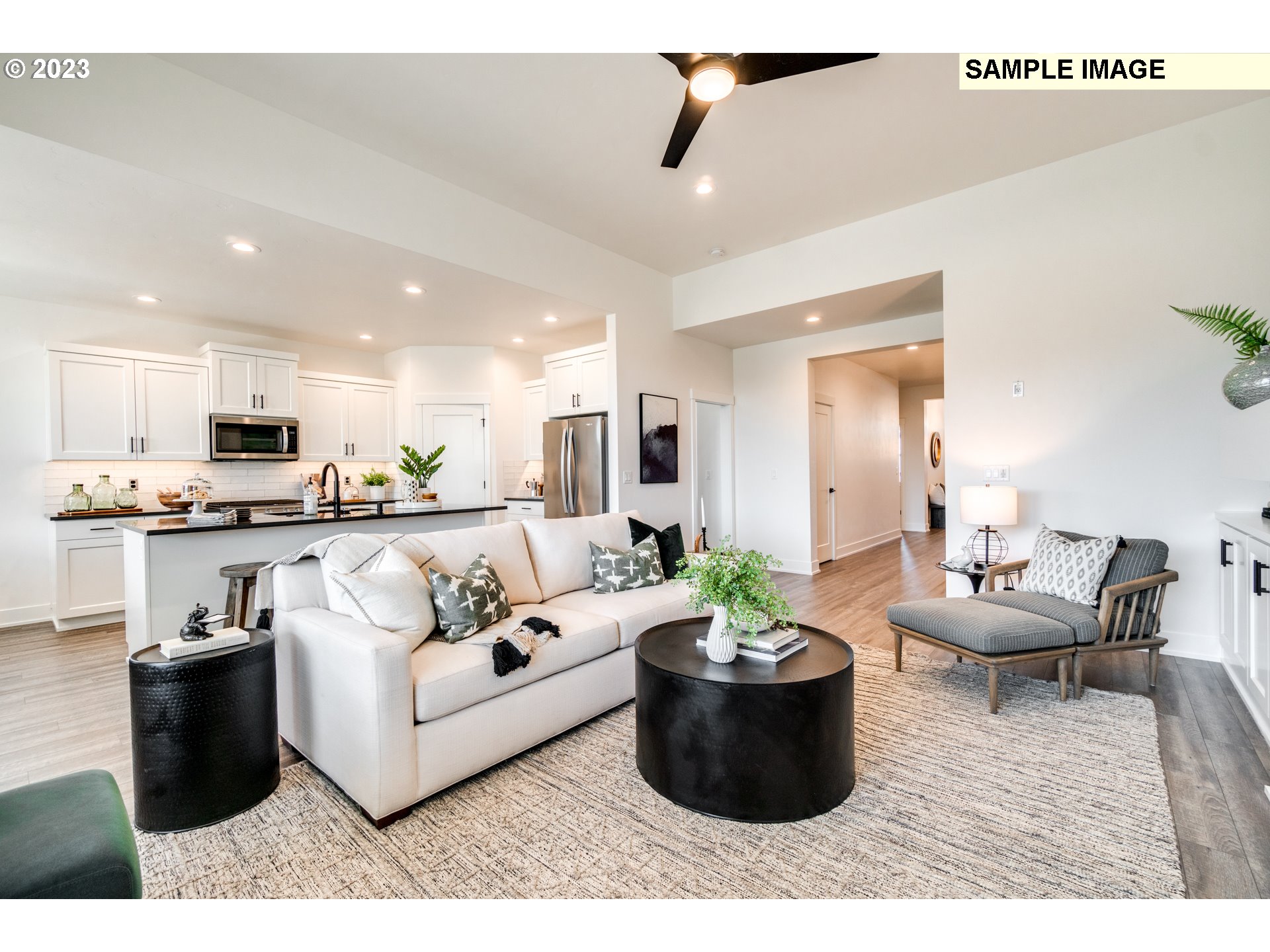 3525 South 44th Avenue Ridgefield, WA 98642 - Photo 2 of 13 a living room with furniture and view of kitchen