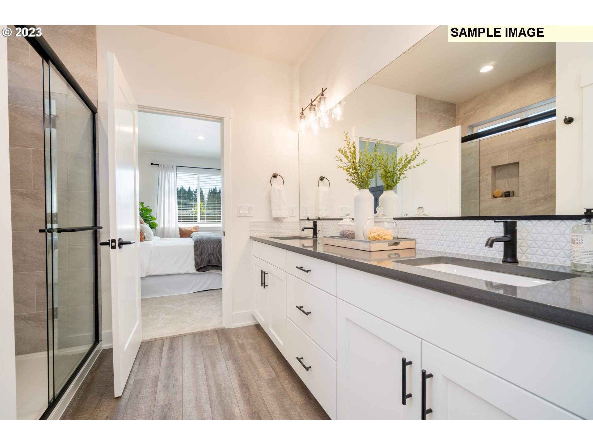 3525 South 44th Avenue Ridgefield, WA 98642 - Photo 3 of 13 a bathroom with a double vanity sink mirror and bathtub
