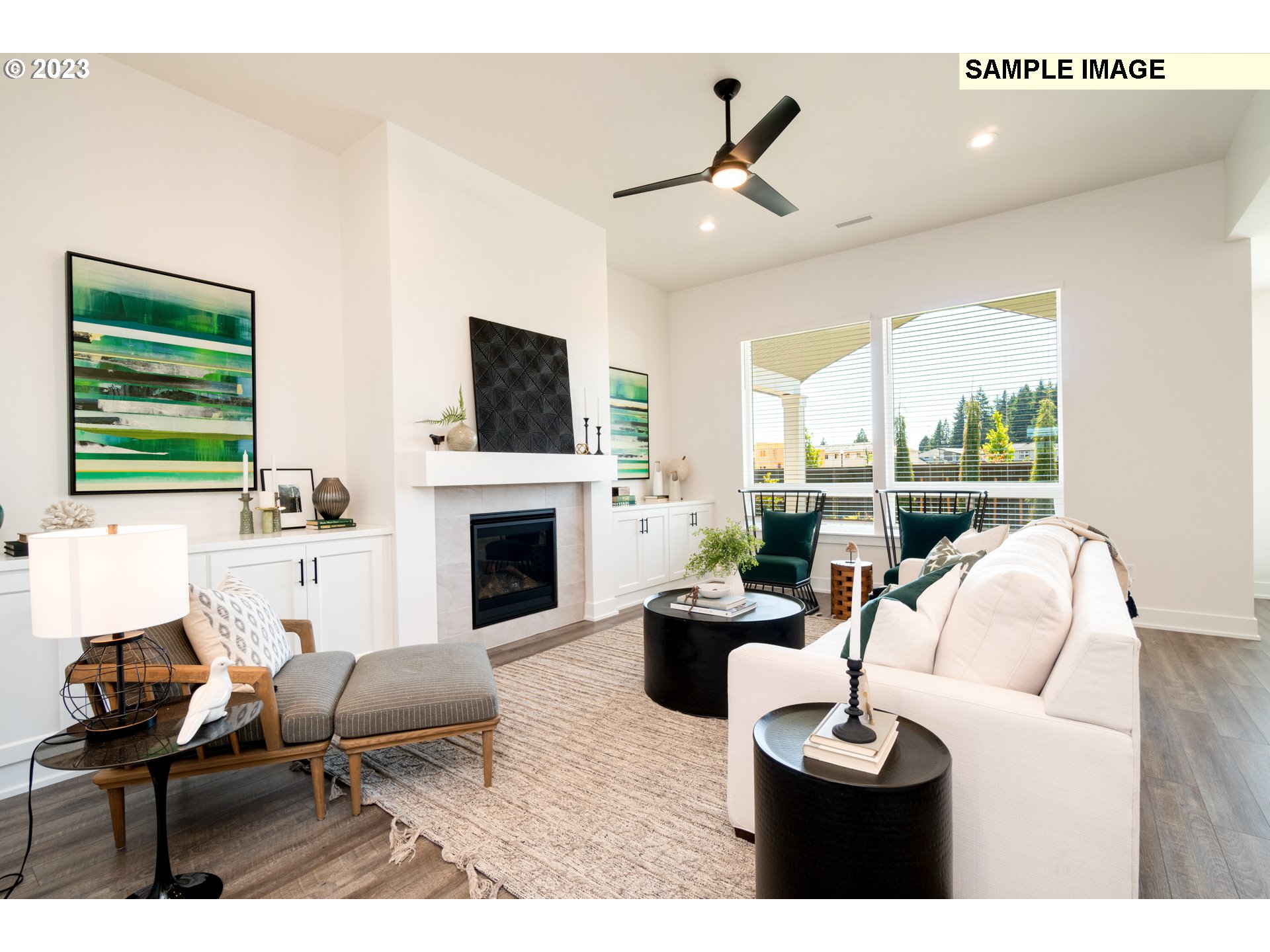3525 South 44th Avenue Ridgefield, WA 98642 - Photo 6 of 13 a living room with furniture a fireplace and a flat screen tv