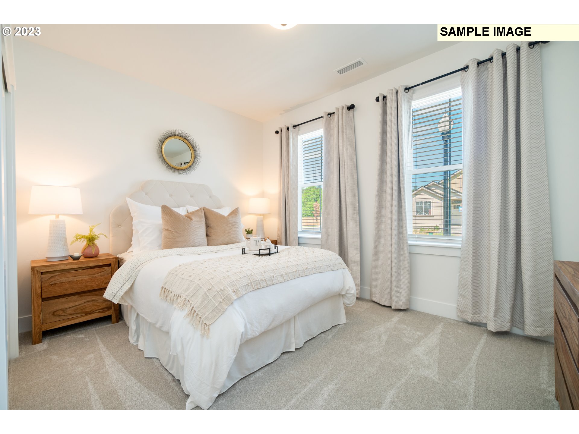 3525 South 44th Avenue Ridgefield, WA 98642 - Photo 8 of 13 a bedroom with a bed and a window