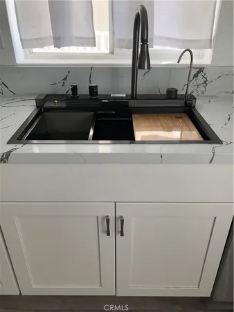 a utility room with washer and dryer