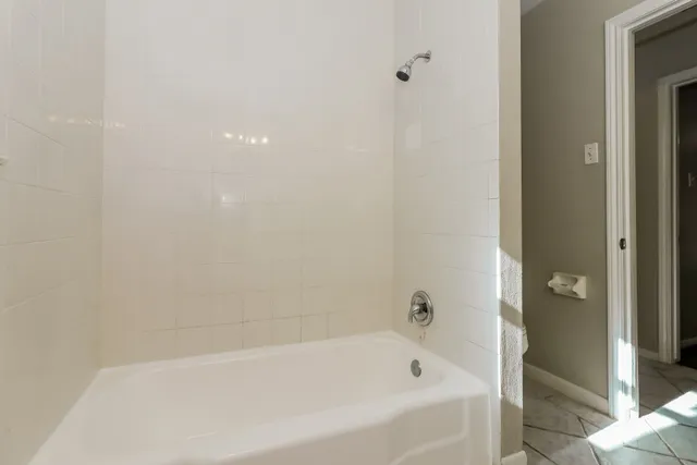 a bathroom with a bathtub