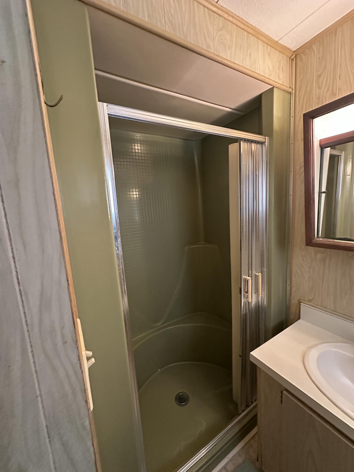 8435 East Club Road Boca Raton, FL 33433 - Photo 19 of 31 a bathroom with a shower and a sink