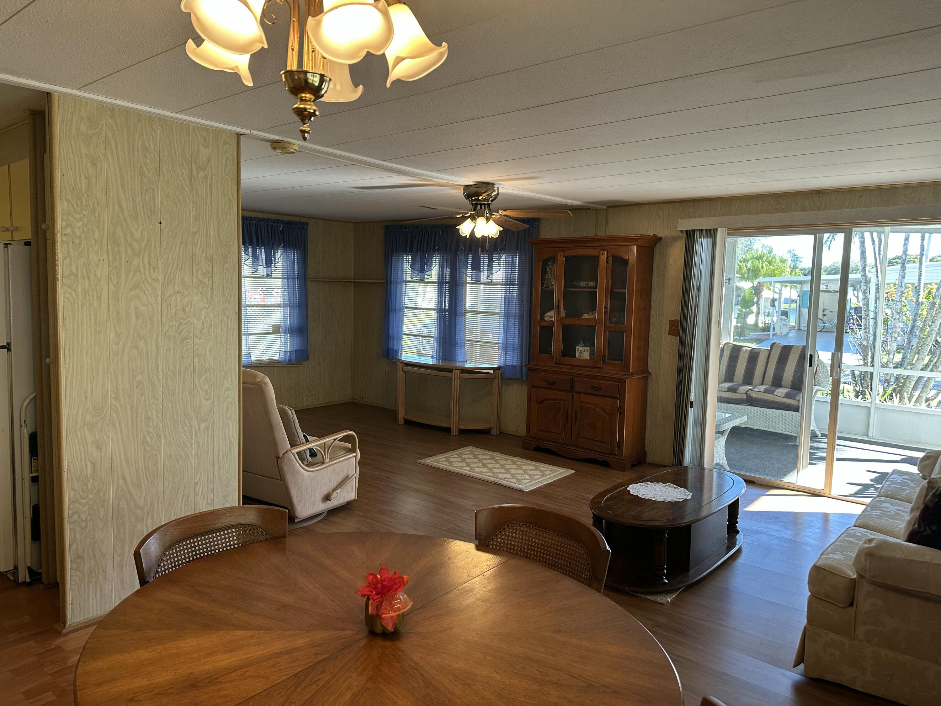 8435 East Club Road Boca Raton, FL 33433 - Photo 7 of 31 a living room with furniture