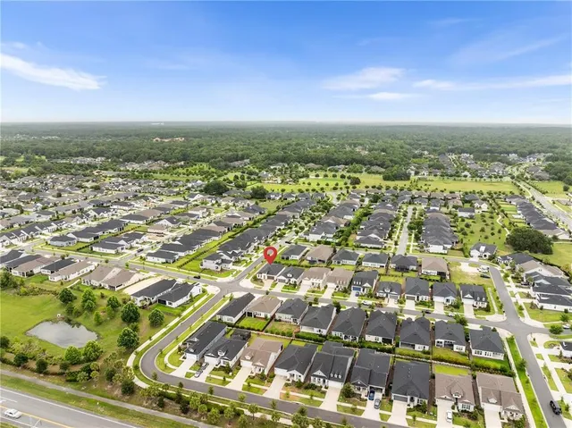 an aerial view of residential building with parking space