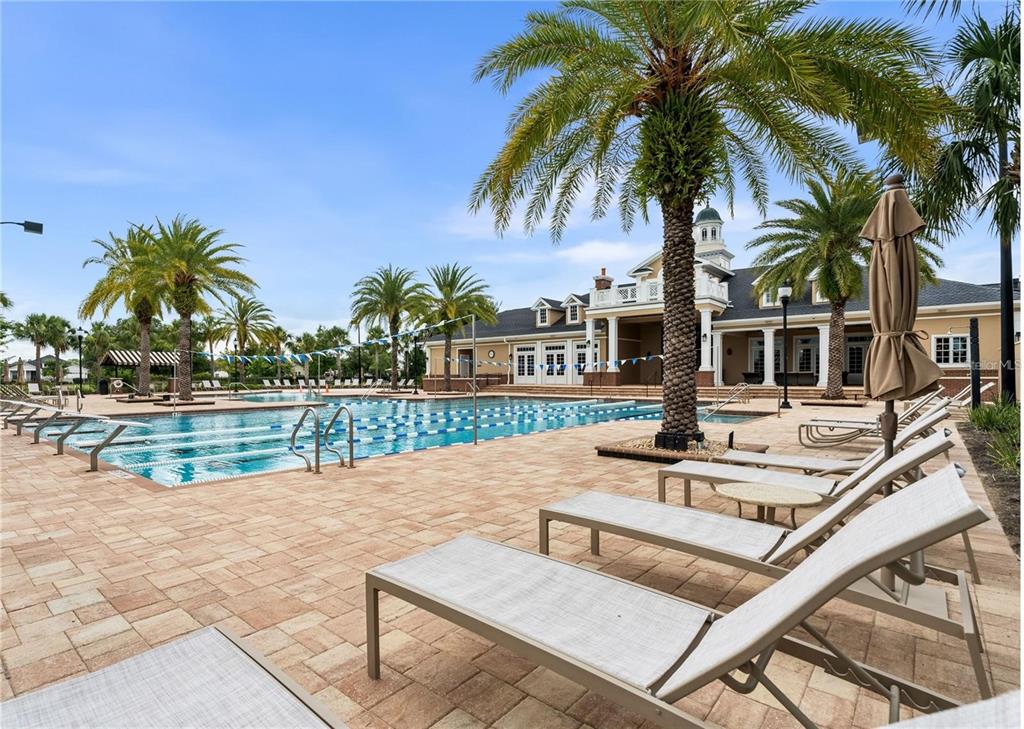3225 Southwest 120th Terrace Gainesville, FL 32608 - Photo 36 of 42 a view of house with swimming pool and lake view