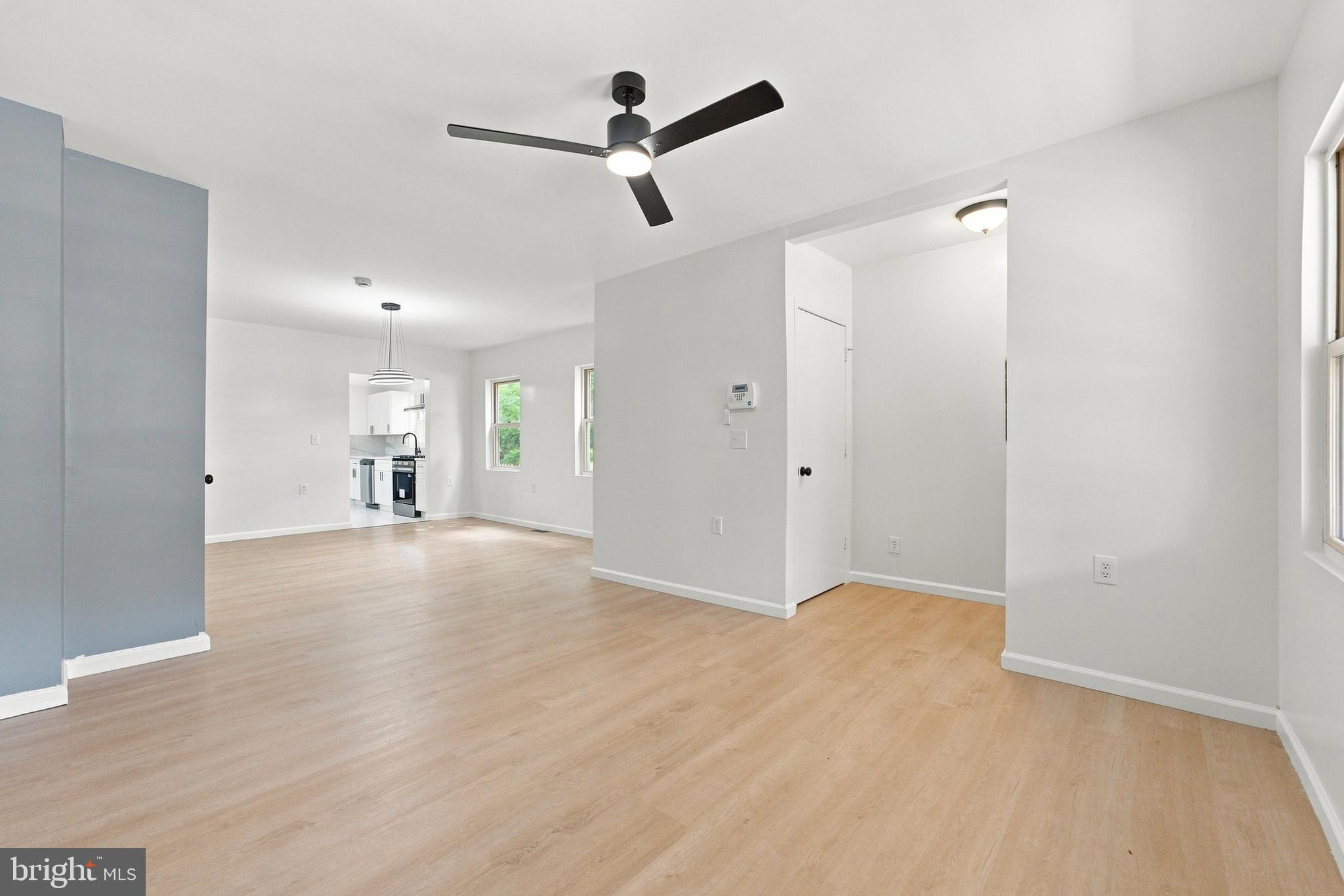 185 Rancocas Road Mount Holly, NJ 08060 - Photo 11 of 34 a view of empty room with wooden floor and ceiling fan