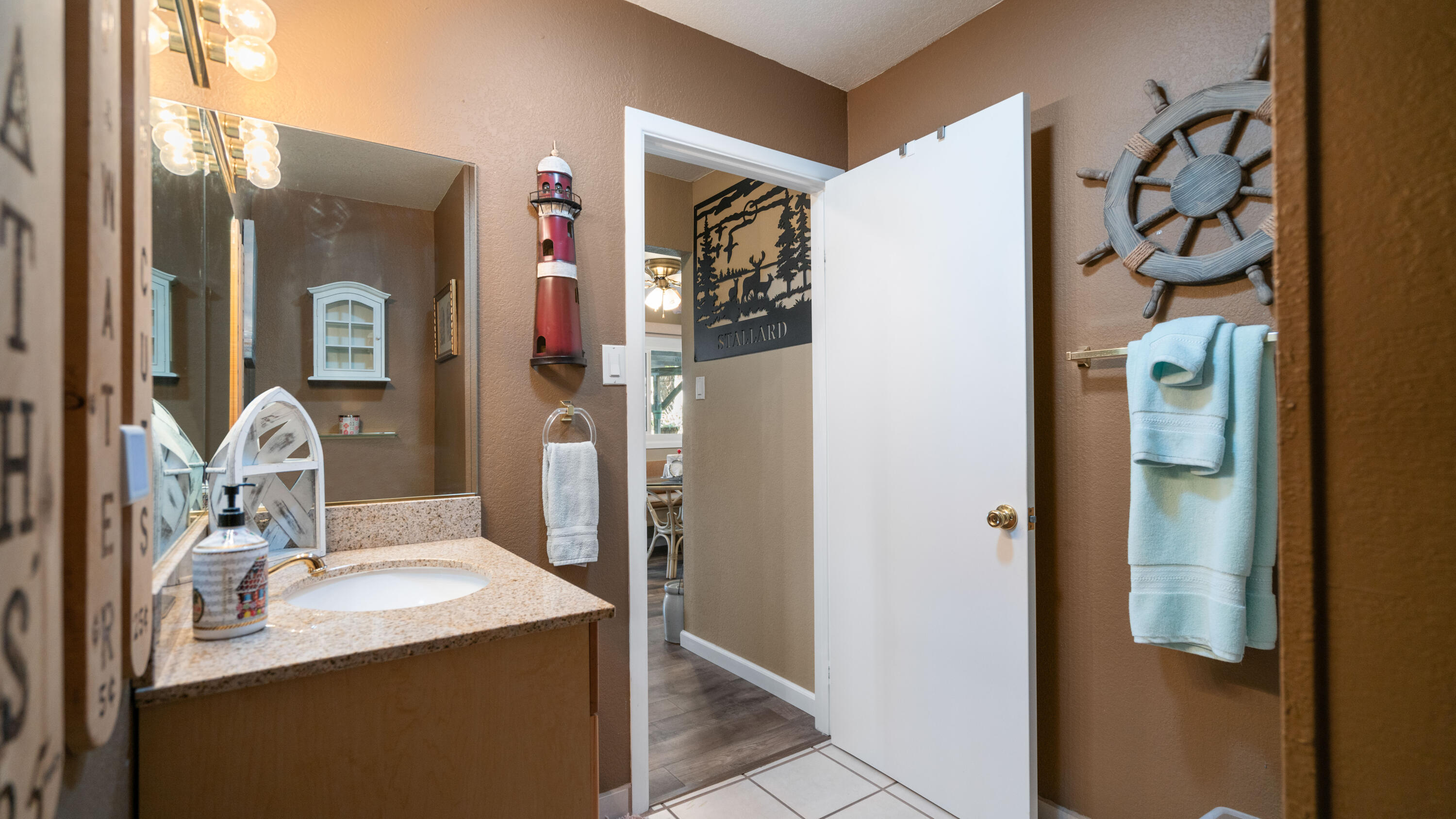 6913 Apache Trail Yucca Valley, CA 92284 - Photo 21 of 45 a bathroom with a sink and a mirror