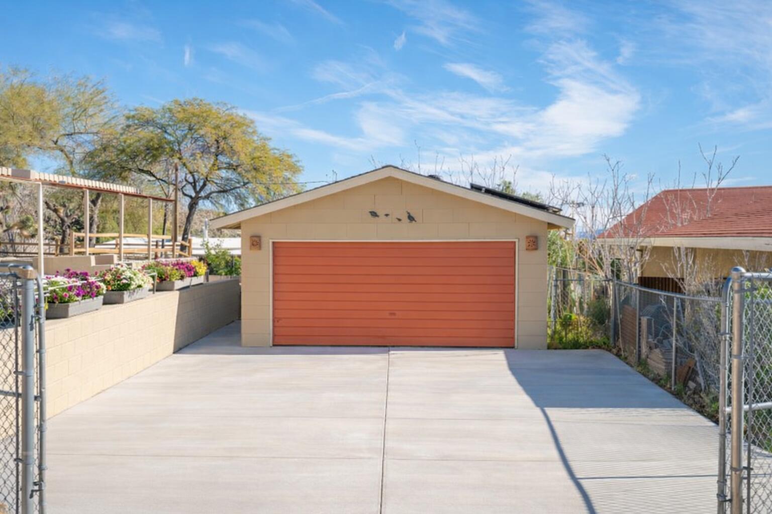 6913 Apache Trail Yucca Valley, CA 92284 - Photo 41 of 45 a view of a house with a garage
