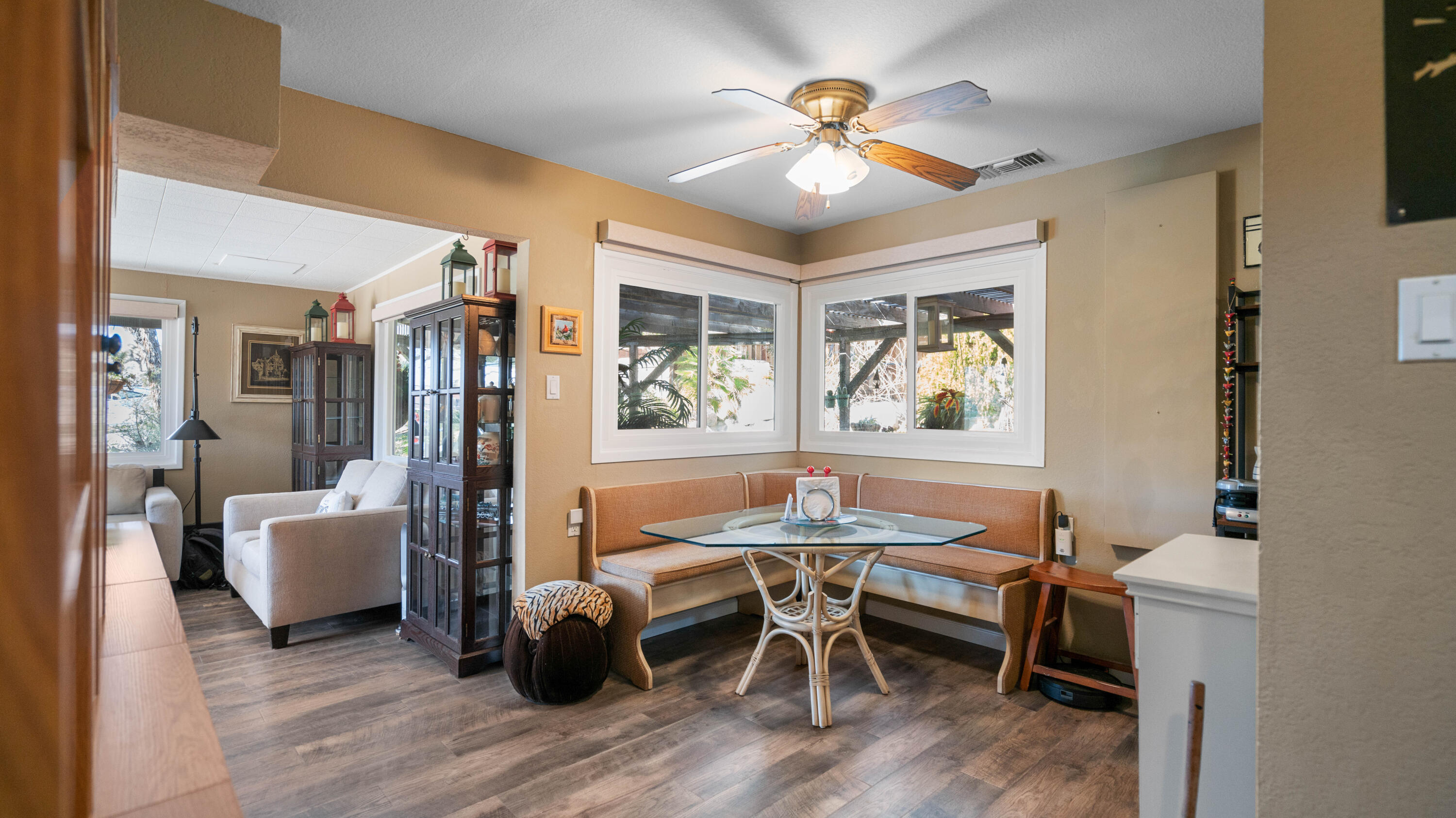 6913 Apache Trail Yucca Valley, CA 92284 - Photo 7 of 45 a workspace with furniture window and wooden floor