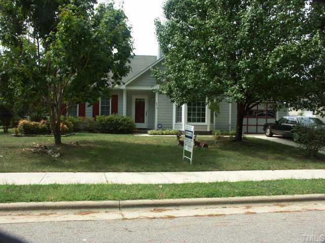 2216 Carthage Circle Raleigh, NC 27604 - Photo 1 of 11 a front view of a house with a yard