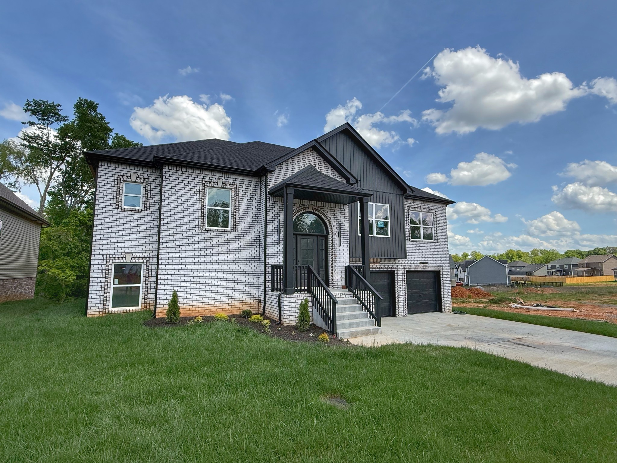 865 Burley Barn Road Clarksville, TN 37042 - Photo 1 of 44 a view of a house with backyard porch and furniture