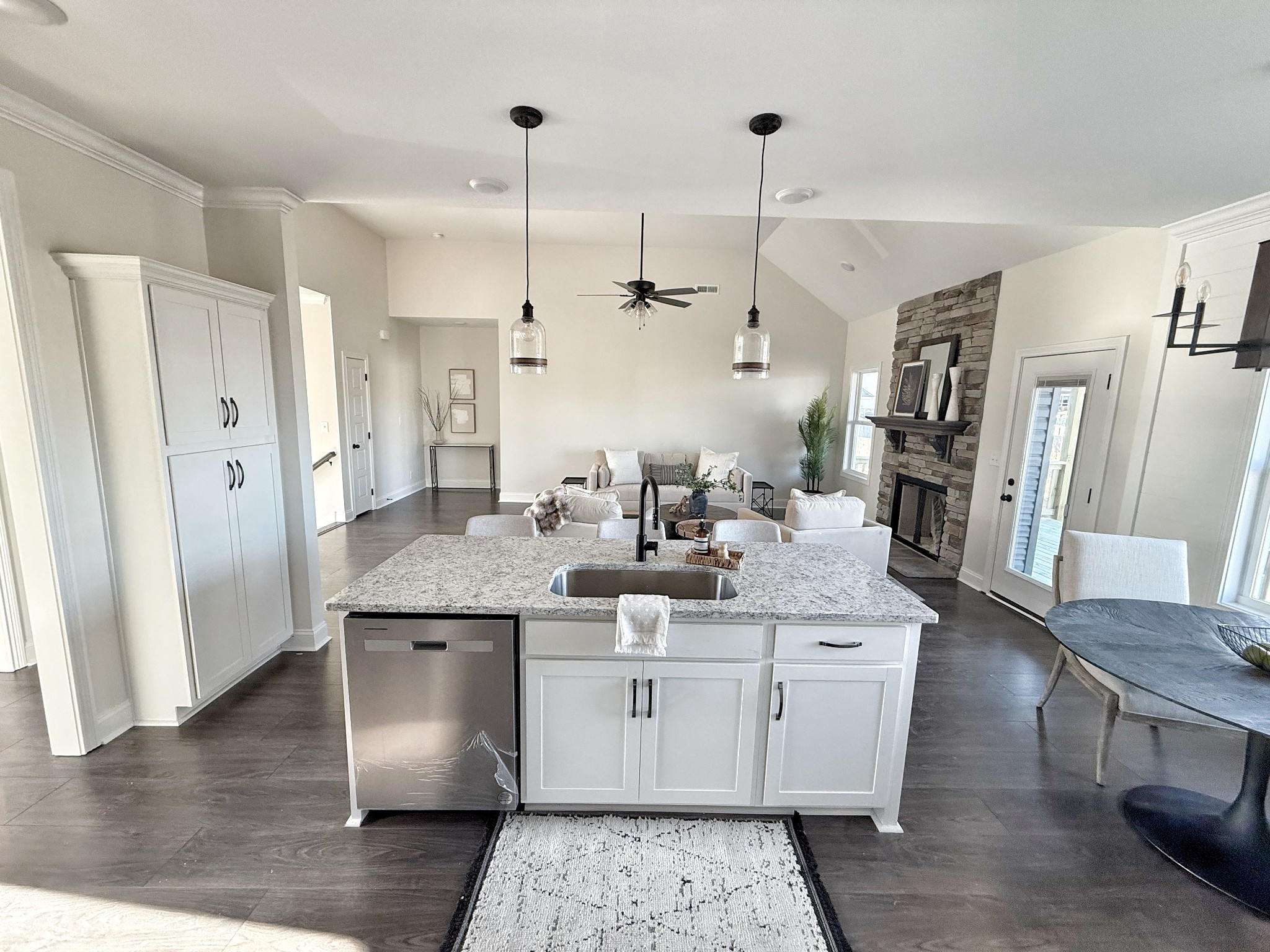 865 Burley Barn Road Clarksville, TN 37042 - Photo 11 of 44 a large kitchen with stainless steel appliances kitchen island granite countertop a refrigerator a stove and a sink