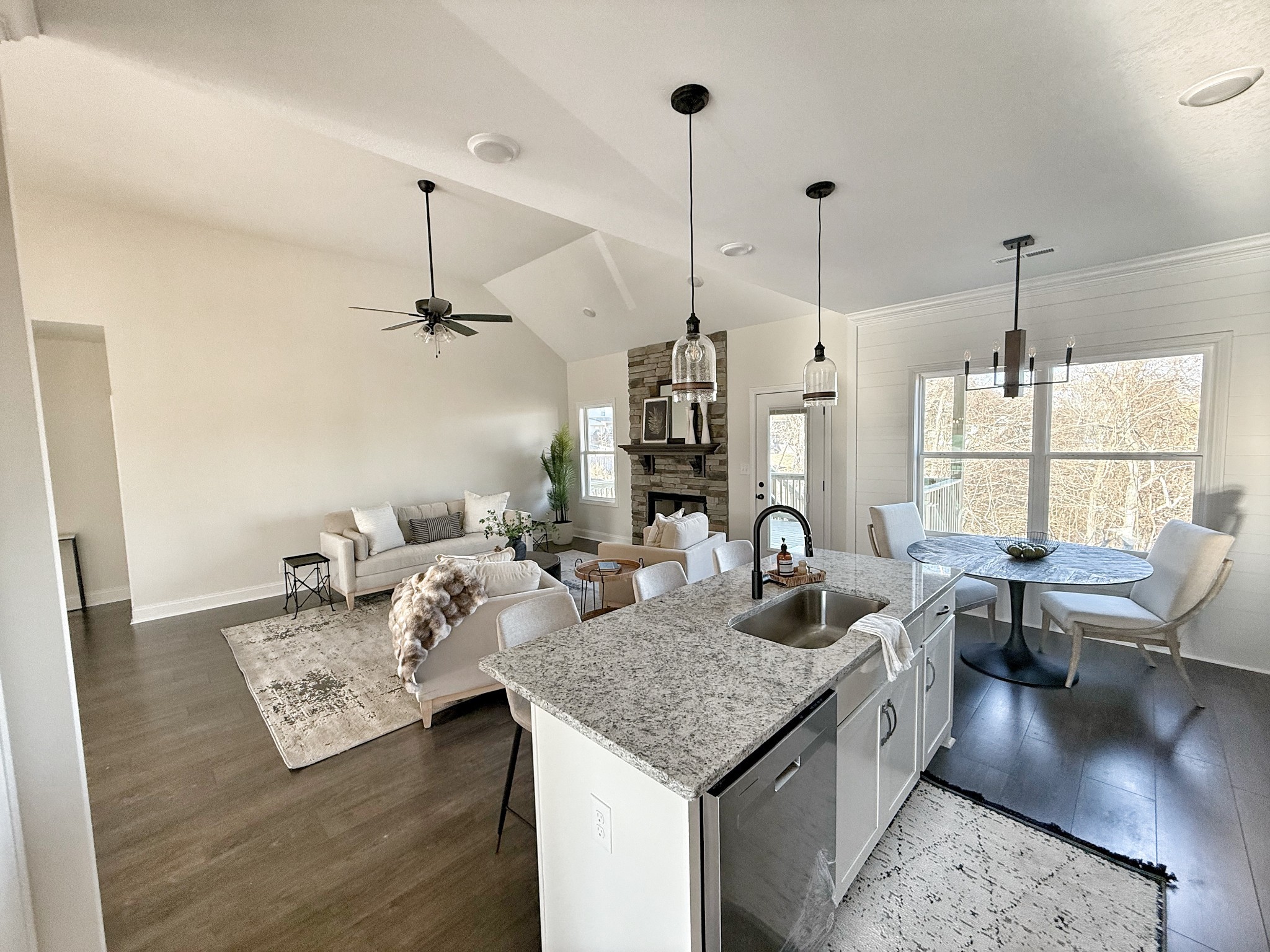 865 Burley Barn Road Clarksville, TN 37042 - Photo 12 of 44 a living room with furniture and a chandelier