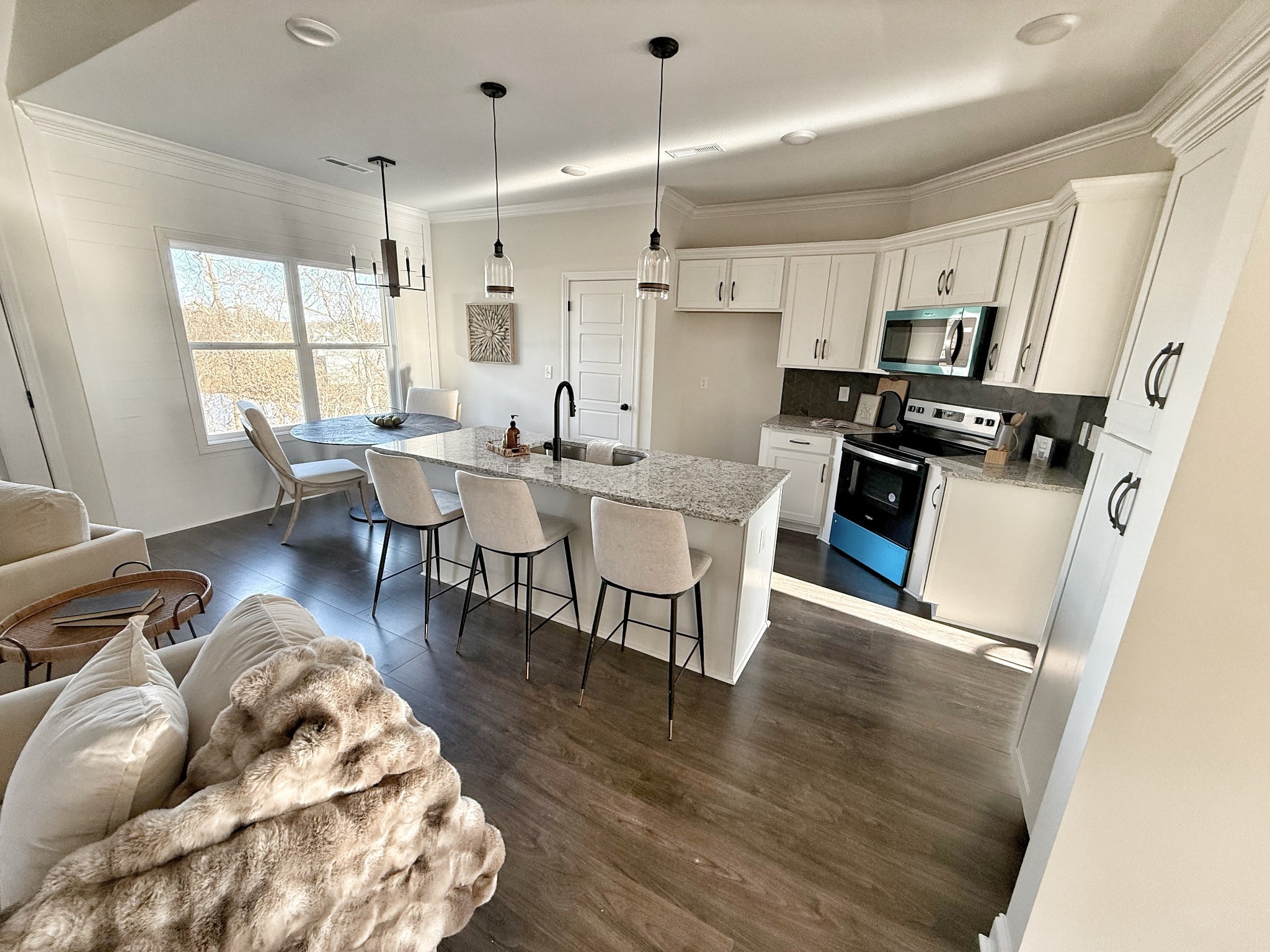 865 Burley Barn Road Clarksville, TN 37042 - Photo 14 of 44 a living room with furniture and a wooden floor