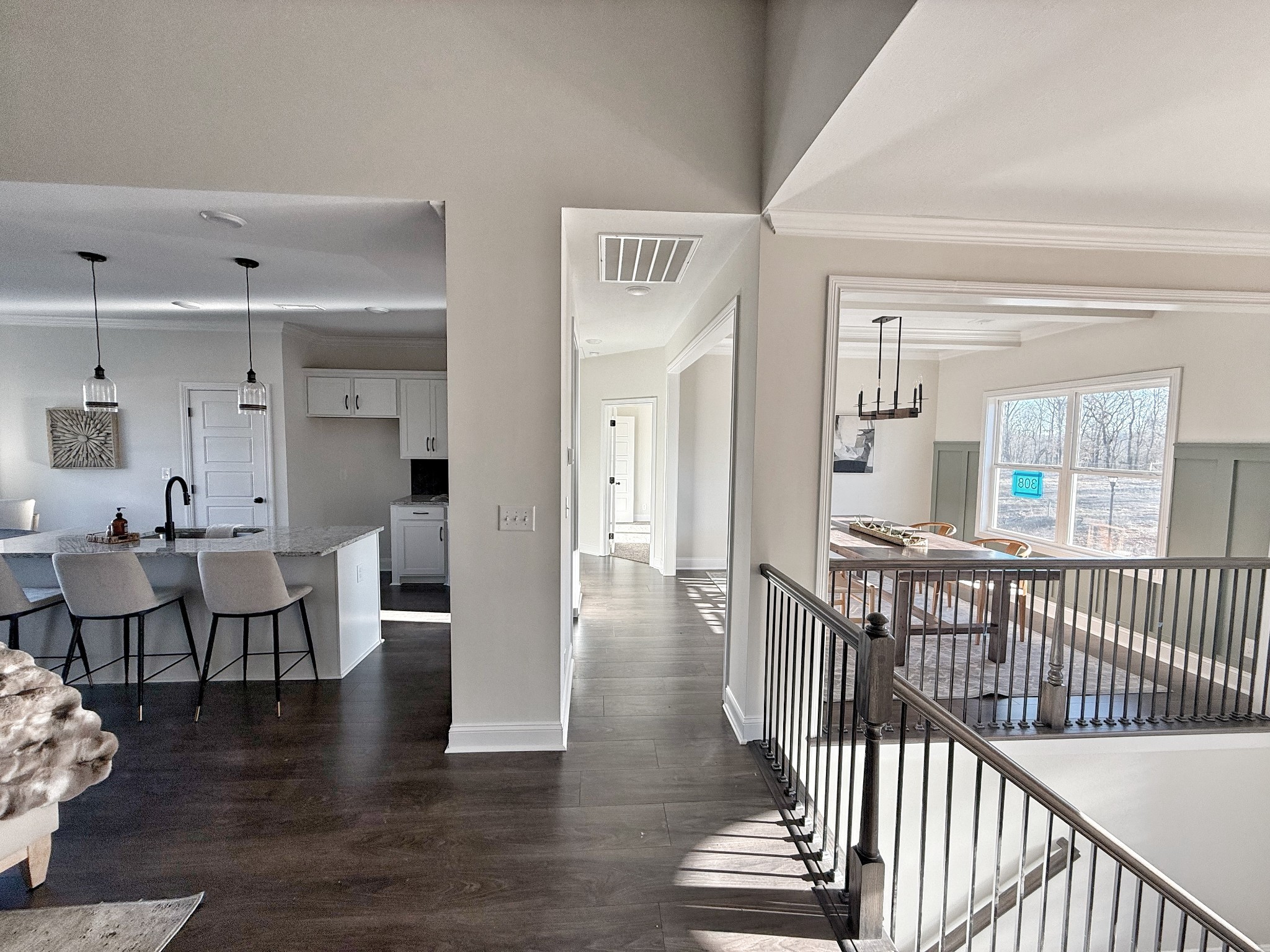 865 Burley Barn Road Clarksville, TN 37042 - Photo 15 of 44 a view of a hallway with wooden floor and windows