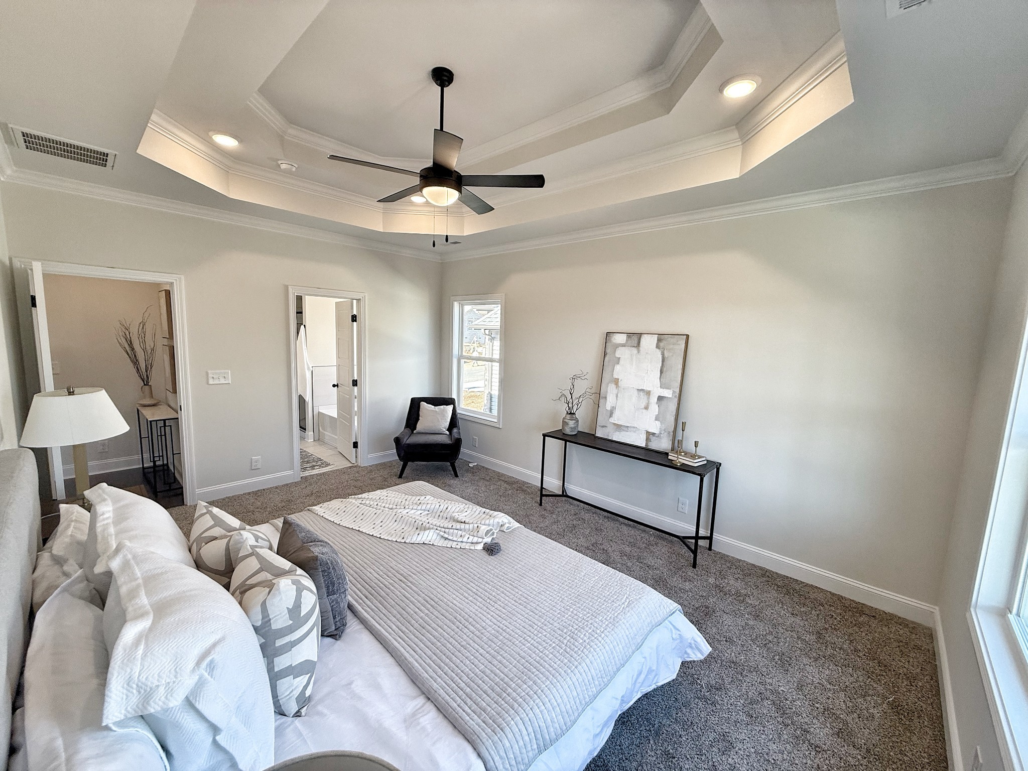 865 Burley Barn Road Clarksville, TN 37042 - Photo 17 of 44 a bedroom with a bed and a chandelier