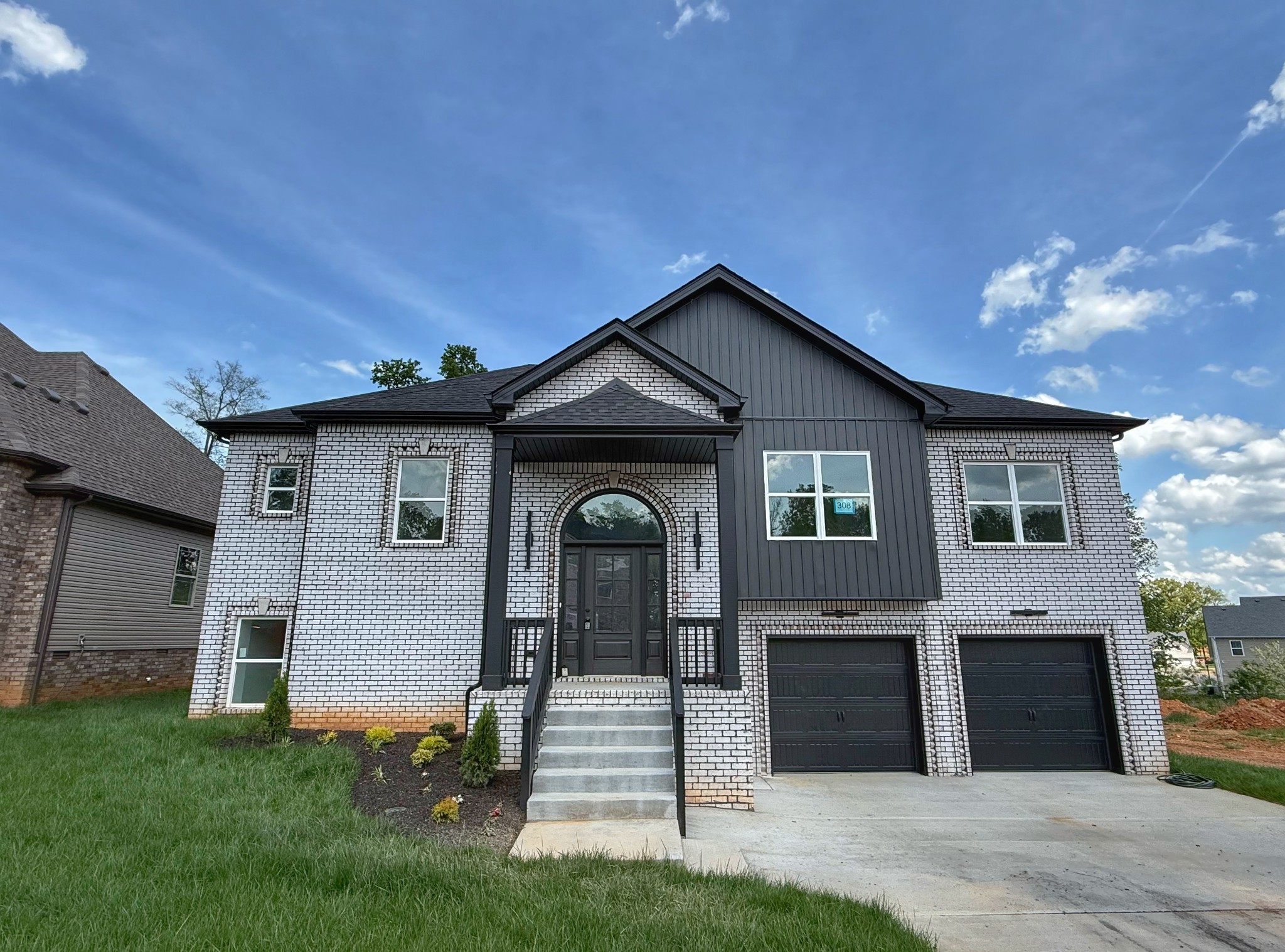 865 Burley Barn Road Clarksville, TN 37042 - Photo 2 of 44 a front view of a house with garden