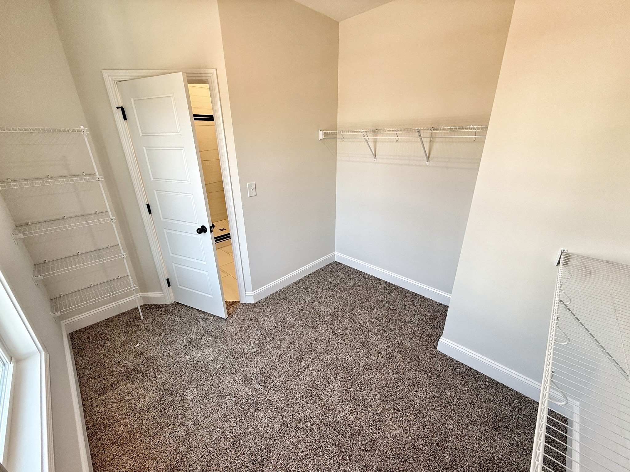 865 Burley Barn Road Clarksville, TN 37042 - Photo 25 of 44 an empty room with windows