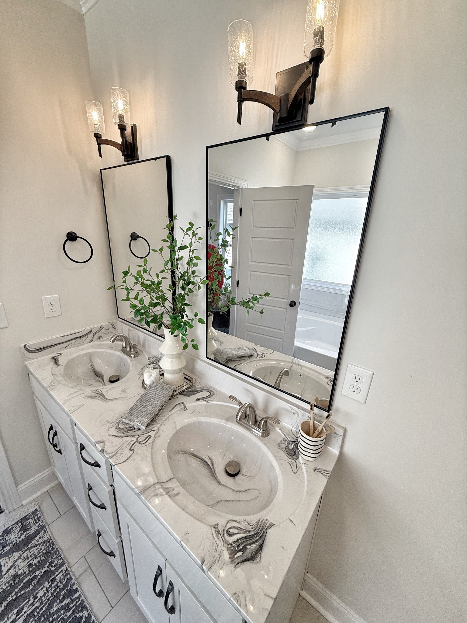 865 Burley Barn Road Clarksville, TN 37042 - Photo 27 of 44 a bathroom with a sink and mirror