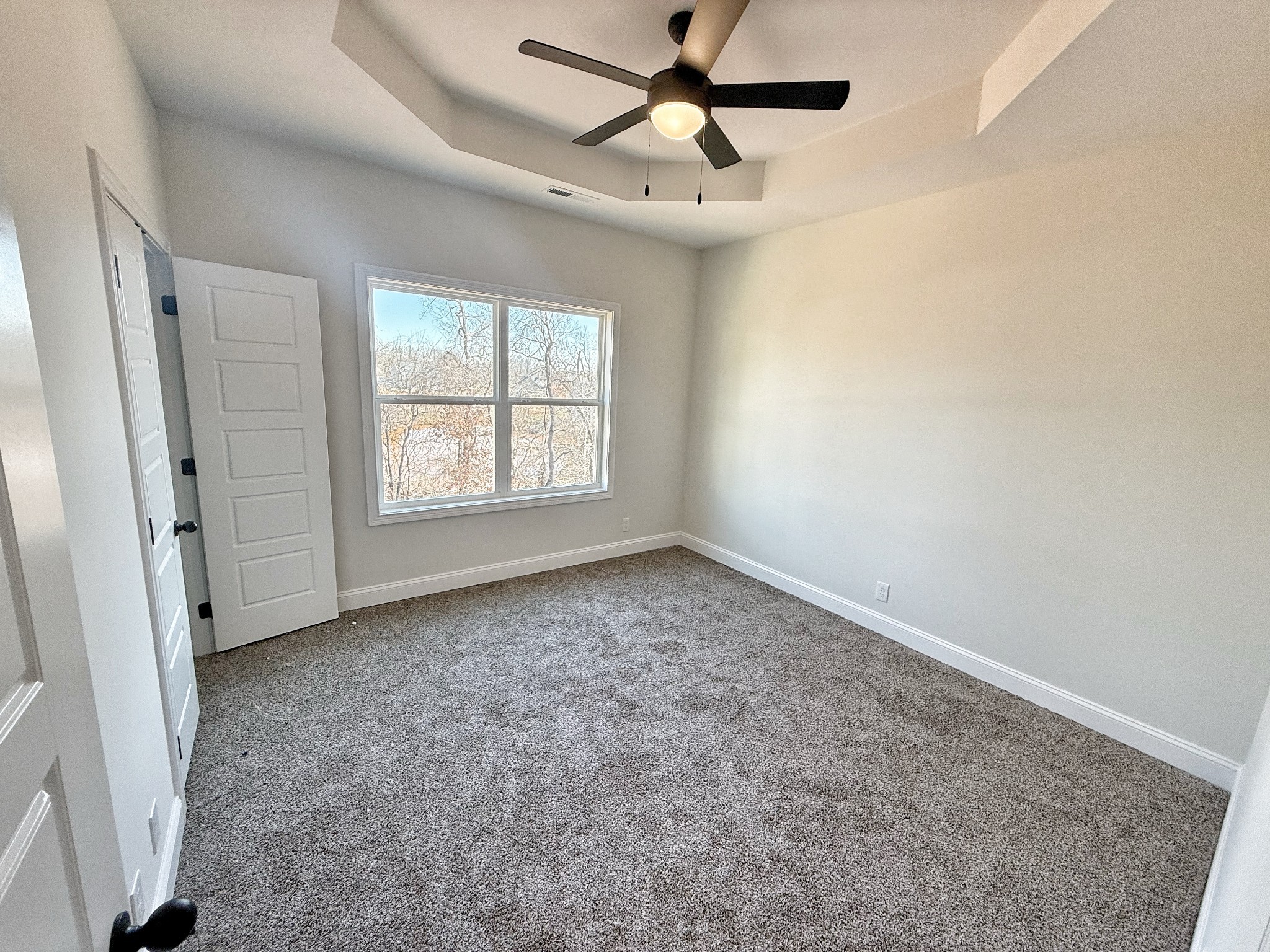 865 Burley Barn Road Clarksville, TN 37042 - Photo 30 of 44 an empty room with a window and a fan