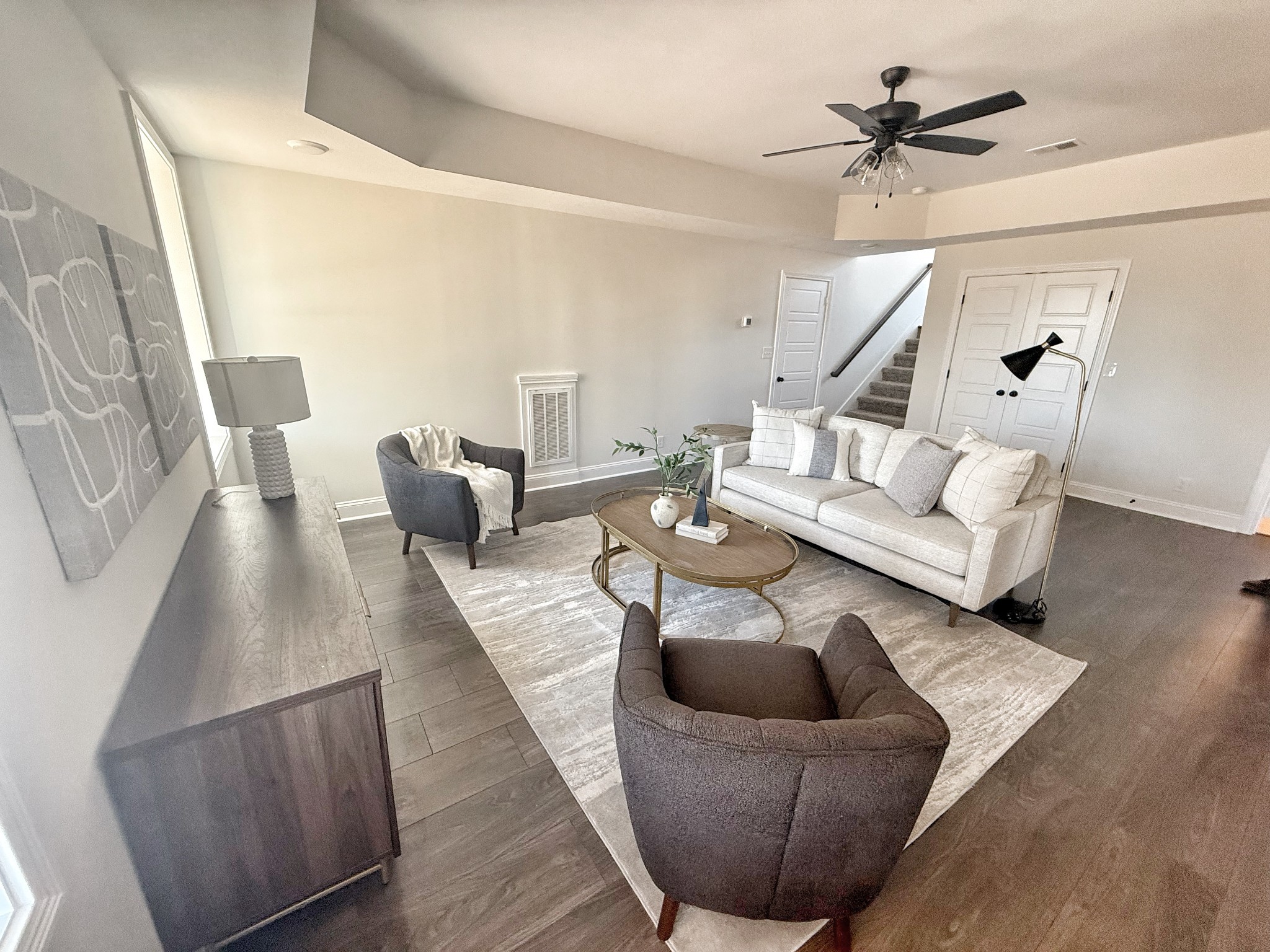 865 Burley Barn Road Clarksville, TN 37042 - Photo 32 of 44 a living room with furniture and a ceiling fan