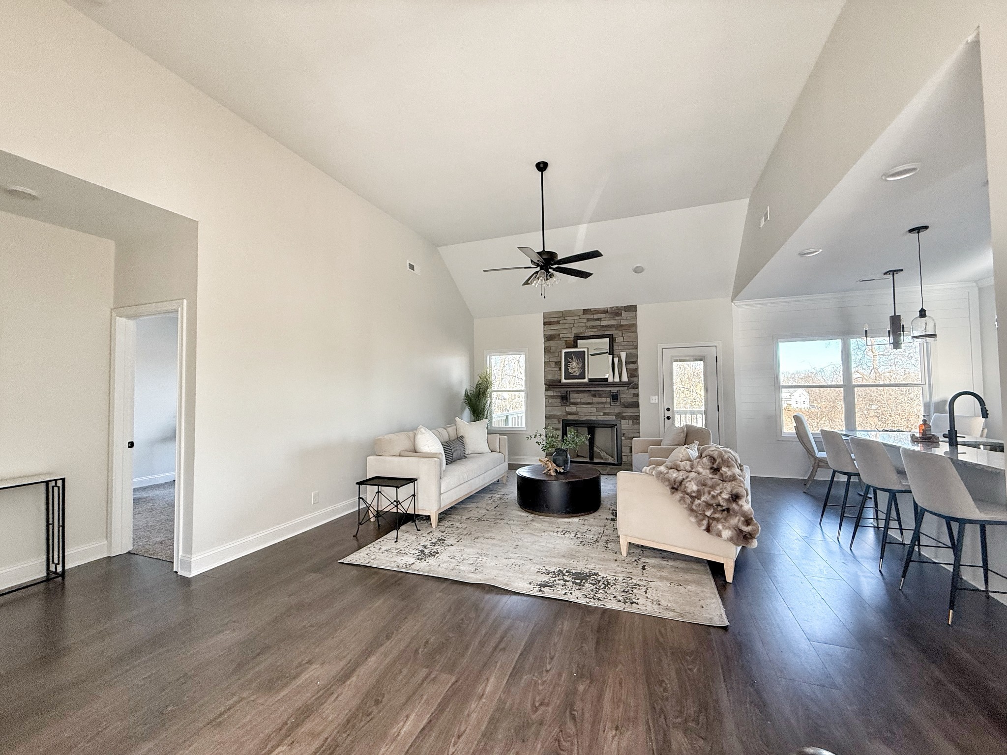 865 Burley Barn Road Clarksville, TN 37042 - Photo 4 of 44 a living room with furniture fireplace and wooden floor