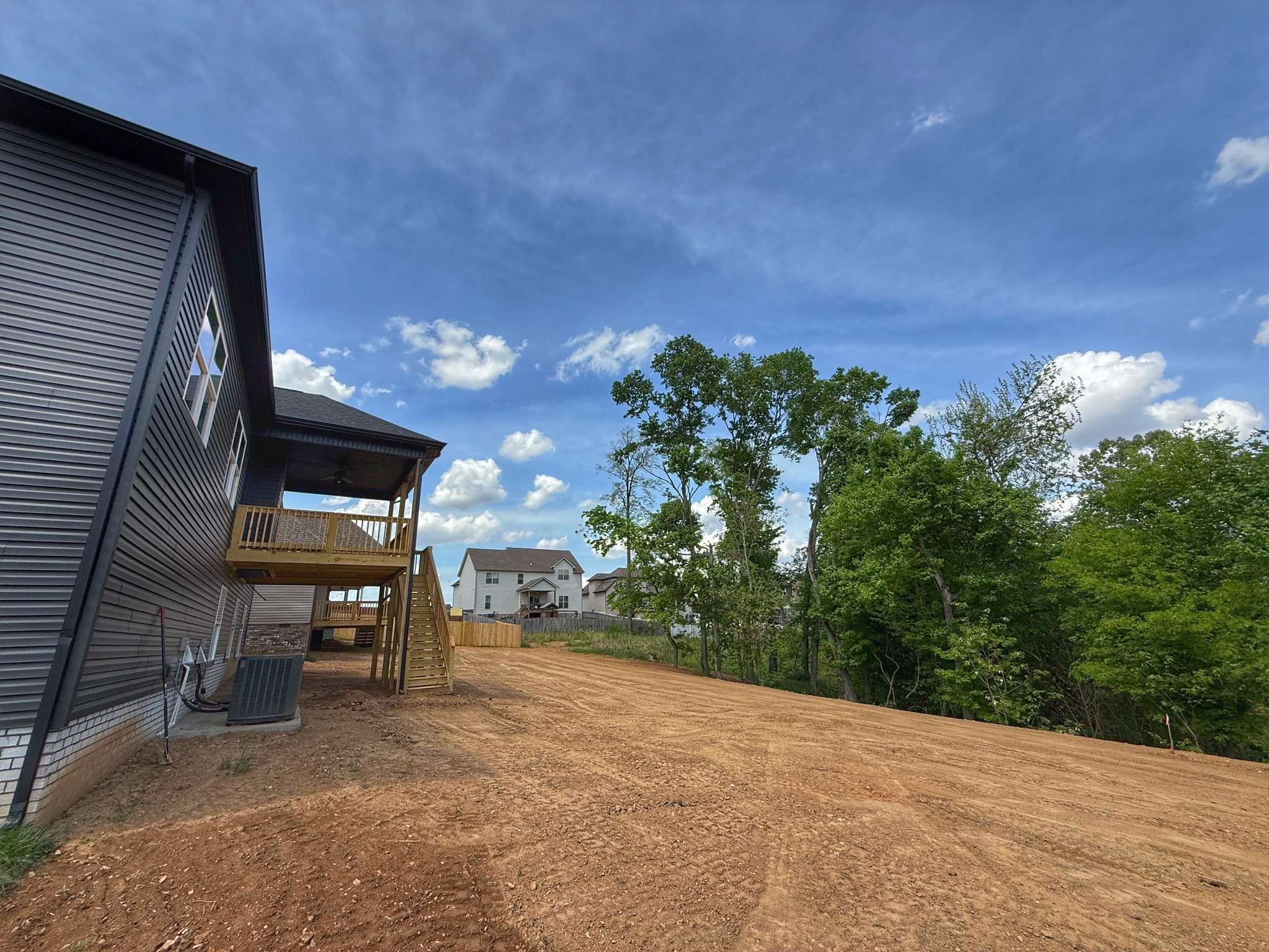 865 Burley Barn Road Clarksville, TN 37042 - Photo 41 of 44 a backyard of a house with table and chairs