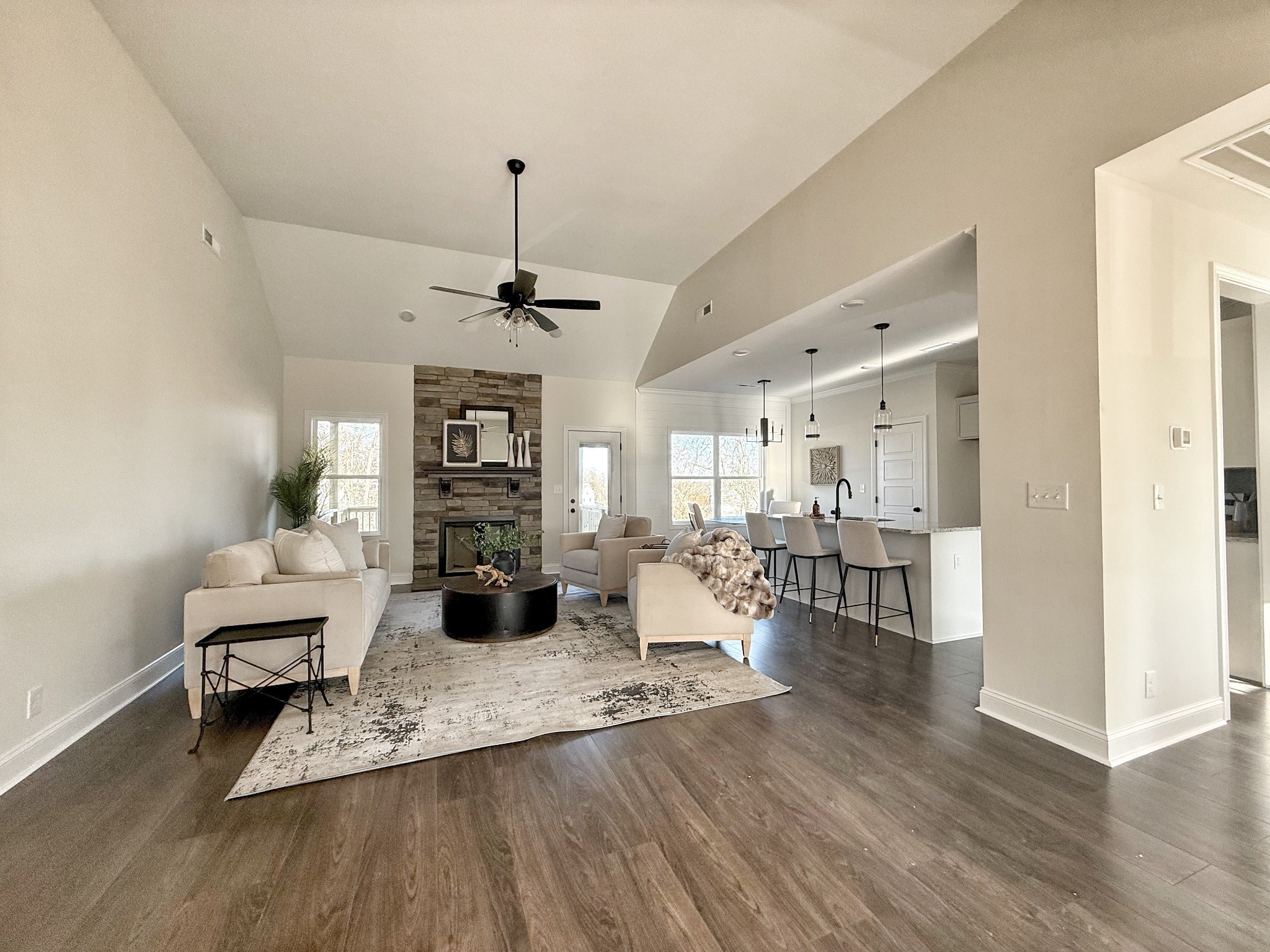 865 Burley Barn Road Clarksville, TN 37042 - Photo 5 of 44 a living room with fireplace furniture and a wooden floor