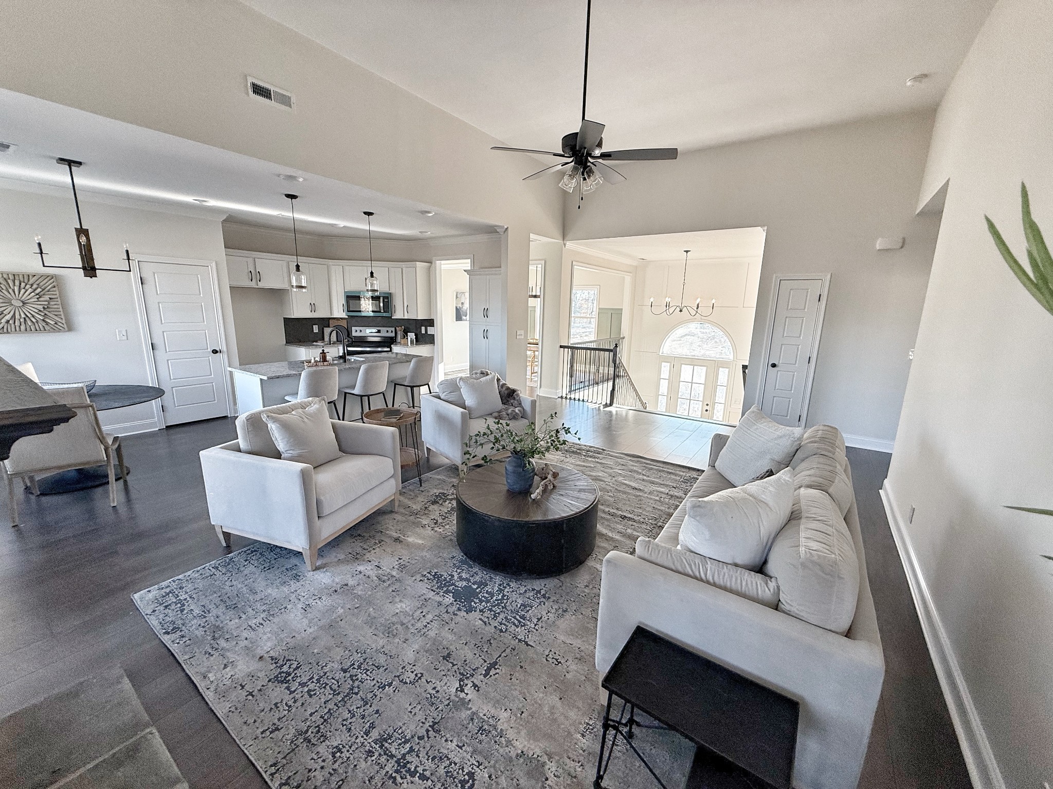 865 Burley Barn Road Clarksville, TN 37042 - Photo 7 of 44 a living room with furniture and a chandelier
