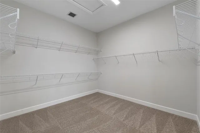 a view of a room with racks on the wall