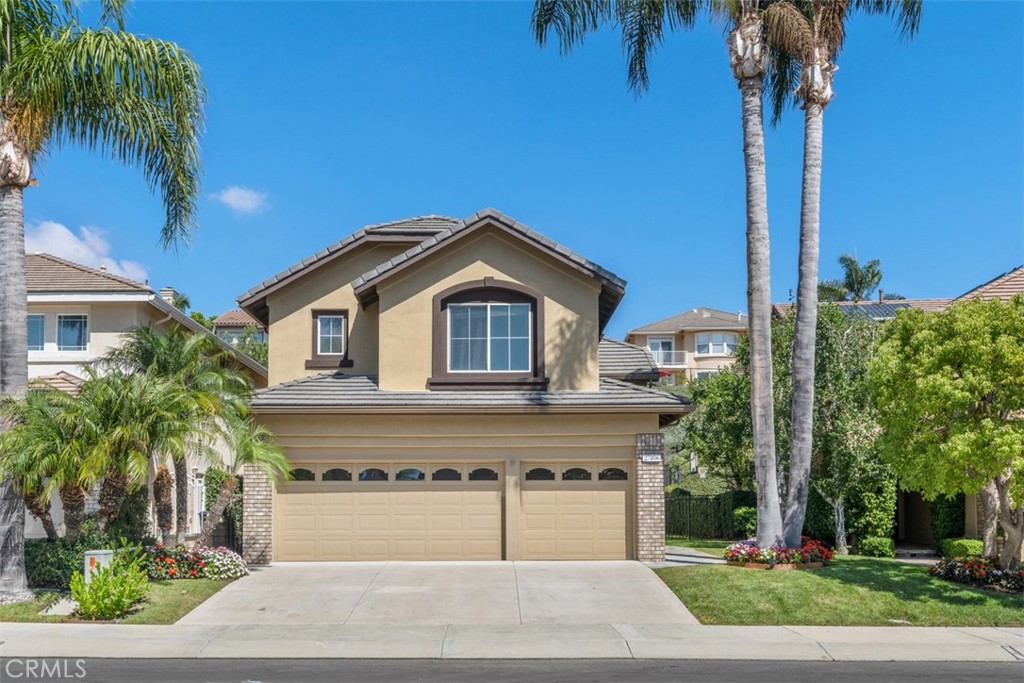 27806 Homestead Road Laguna Niguel, CA 92677 - Photo 1 of 52 a front view of a house with garden