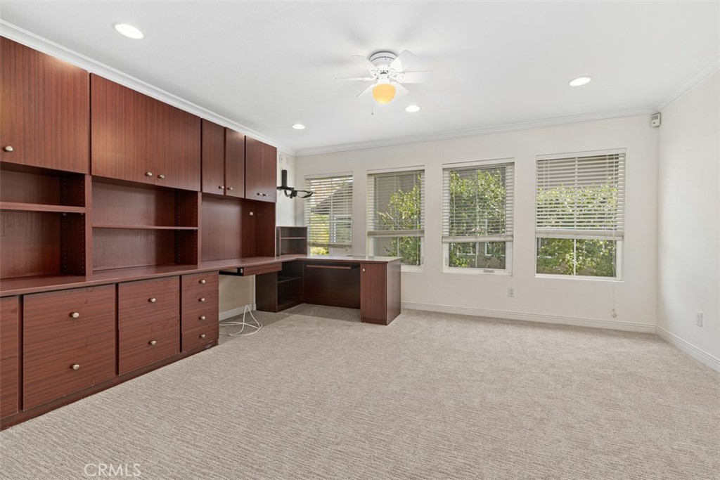 27806 Homestead Road Laguna Niguel, CA 92677 - Photo 23 of 52 a large kitchen with stainless steel appliances a large counter top a stove and a refrigerator