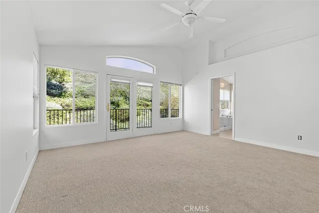 a large spacious bathroom with a large tub and sink