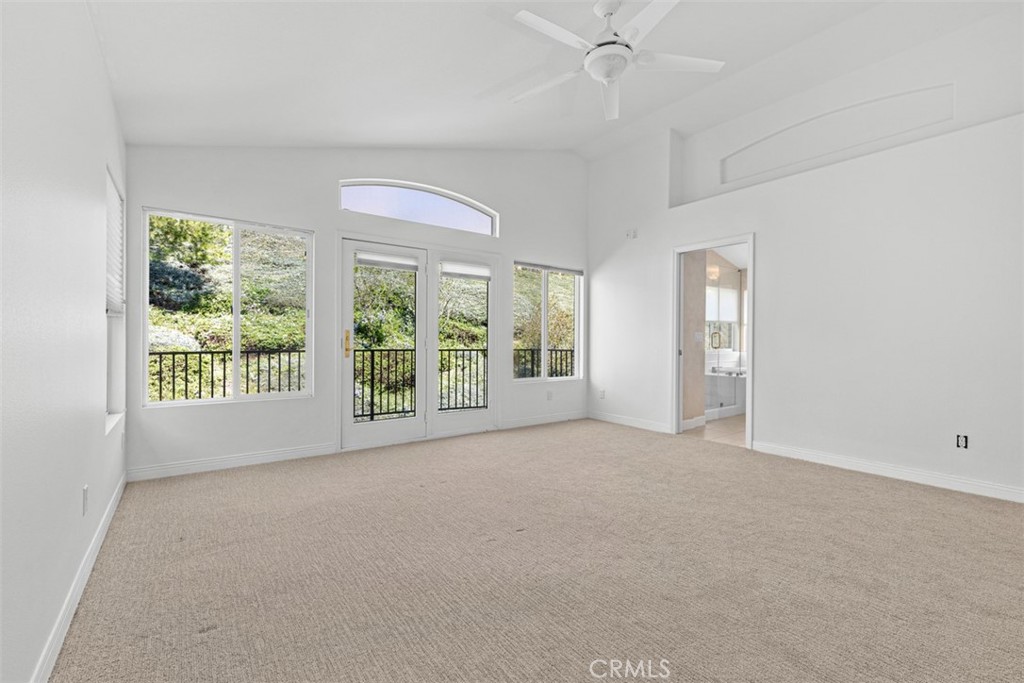 27806 Homestead Road Laguna Niguel, CA 92677 - Photo 25 of 52 a view of a big room with windows and chandelier fan