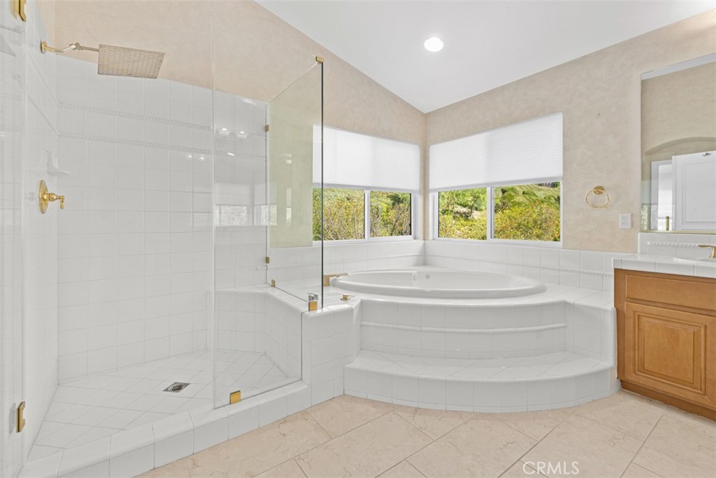 27806 Homestead Road Laguna Niguel, CA 92677 - Photo 27 of 52 a bathroom with a tub shower and sink