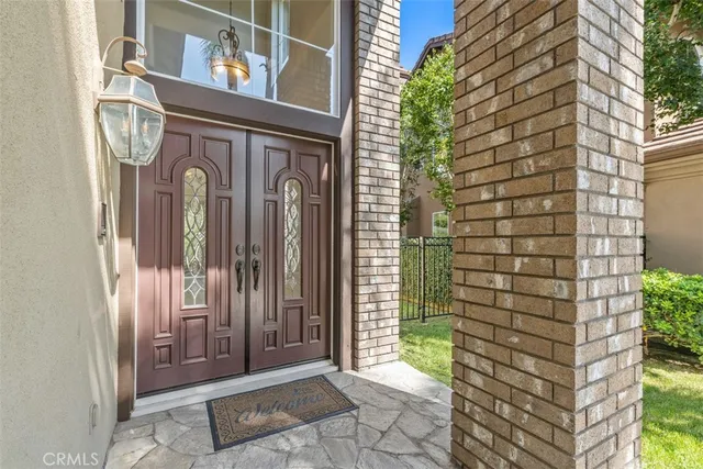 a view of an entryway with wooden floor