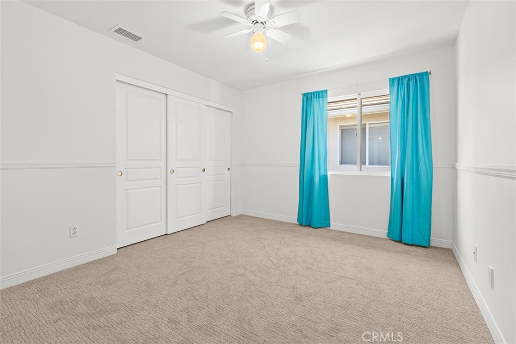 27806 Homestead Road Laguna Niguel, CA 92677 - Photo 33 of 52 an empty room with closet and fan