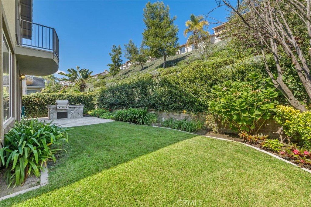 27806 Homestead Road Laguna Niguel, CA 92677 - Photo 36 of 52 a view of a house with a yard