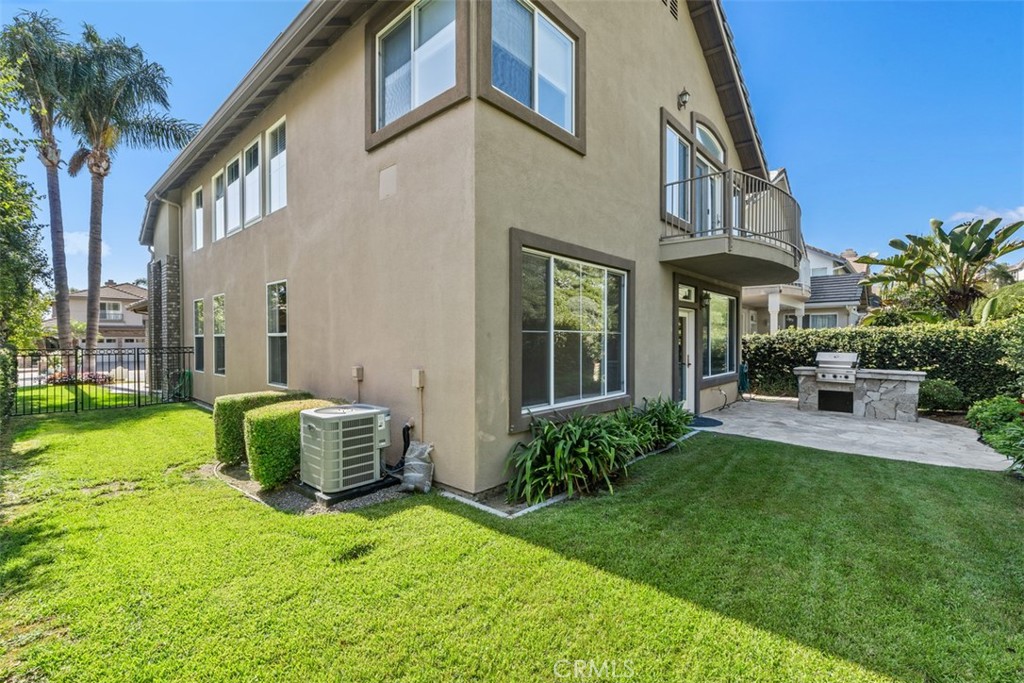 27806 Homestead Road Laguna Niguel, CA 92677 - Photo 38 of 52 a view of a house with backyard sitting area and garden