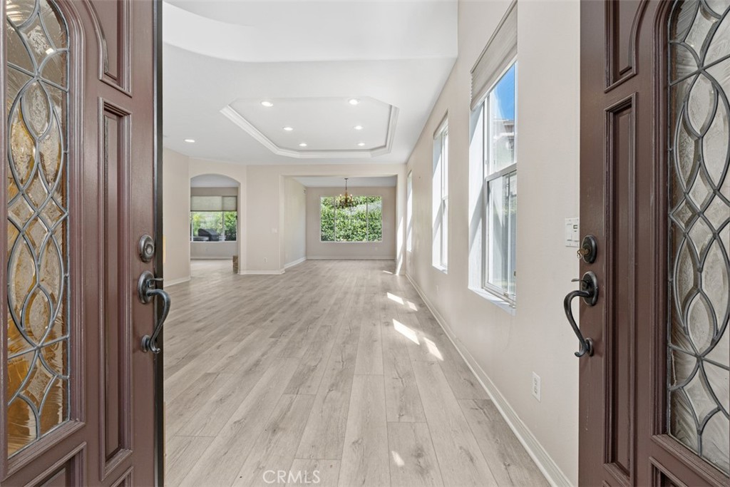 27806 Homestead Road Laguna Niguel, CA 92677 - Photo 4 of 52 a view of an entryway with wooden floor