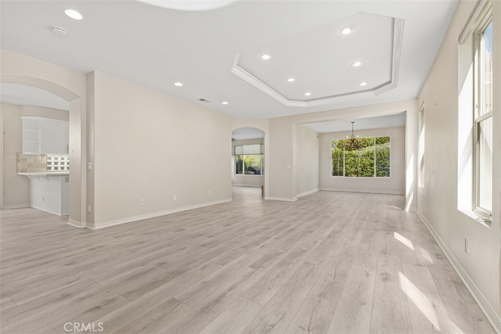 27806 Homestead Road Laguna Niguel, CA 92677 - Photo 5 of 52 an empty room with wooden floor and windows