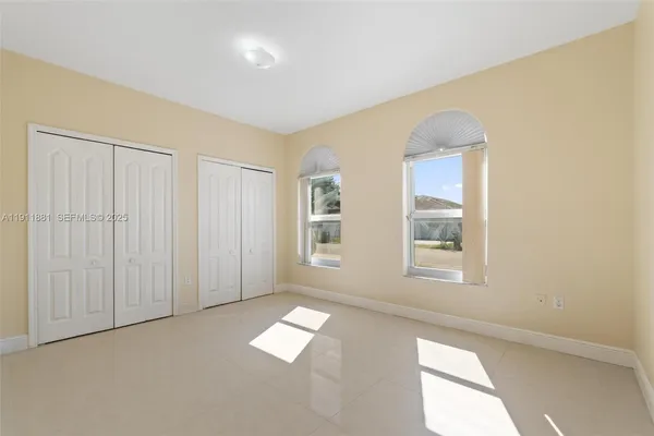 an empty room with windows