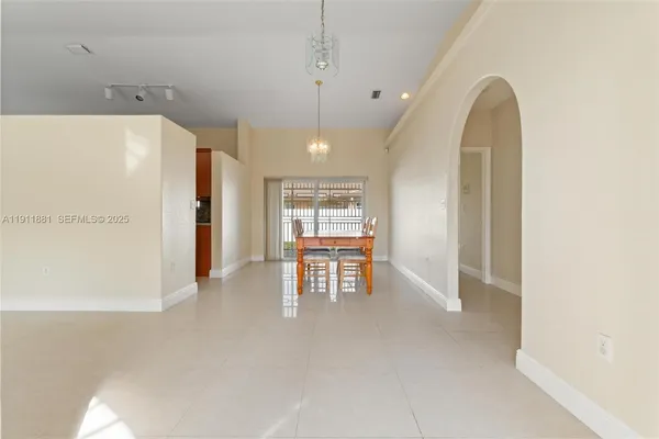 a view of a livingroom with furniture and window